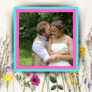 couple hugging, husband kissing his wife on the cheek, flowers