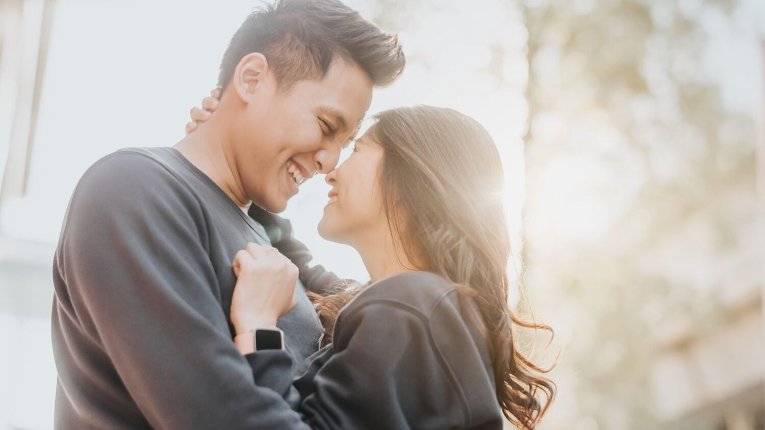 man and woman looking at each other with love