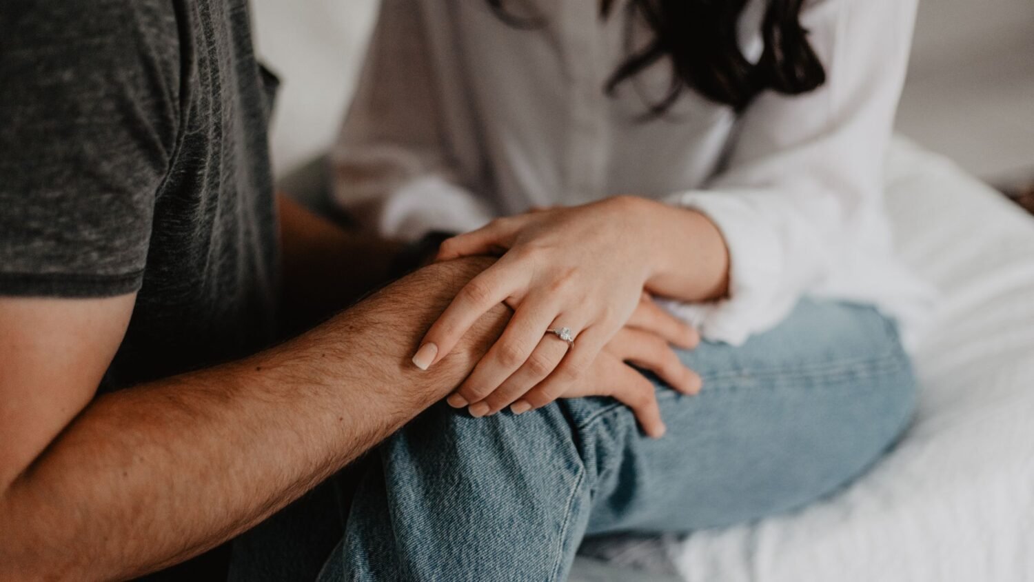 woman and man holding hands representing why do you not enjoy intimacy subject
