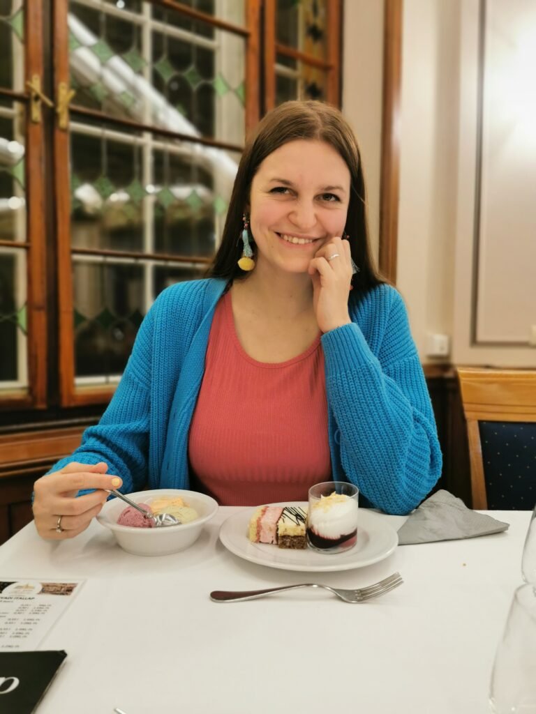 girl smiling and eating ice cream on a date
