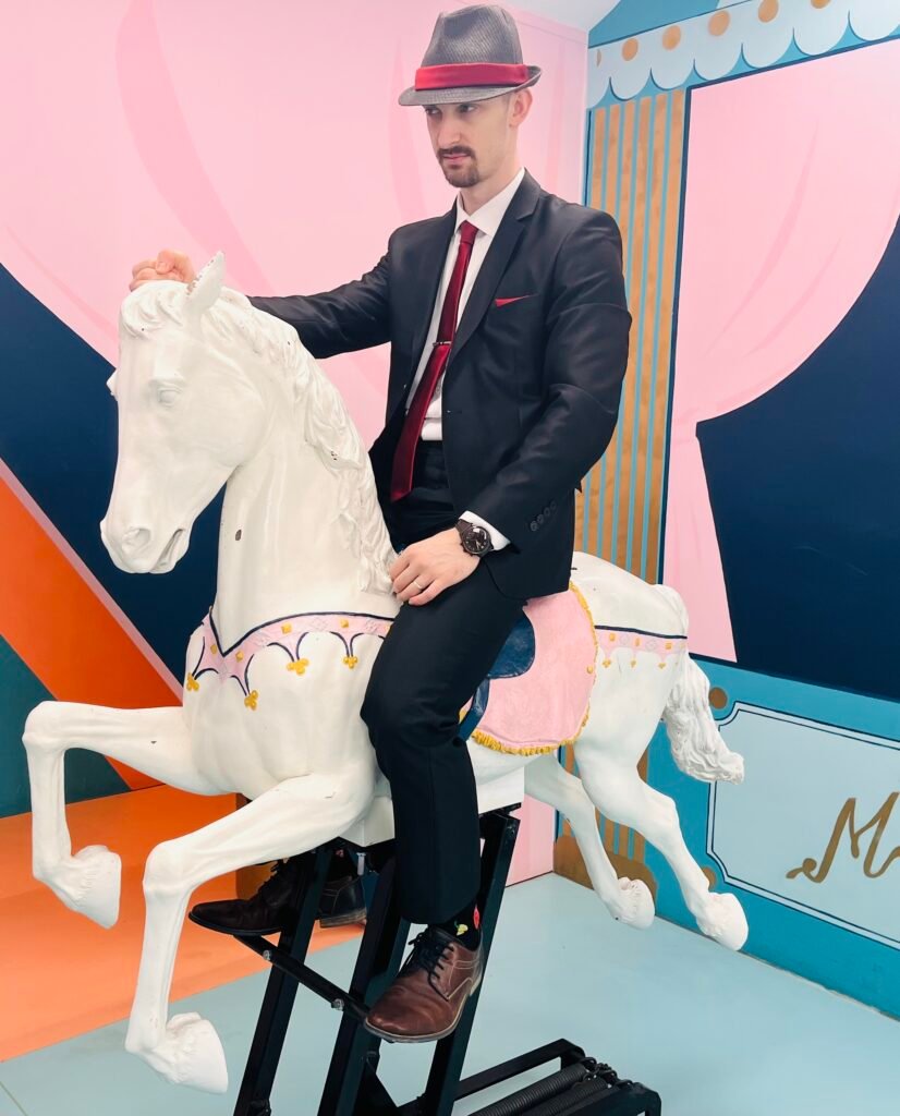 husband characteristics - man in the suit sitting on a white horse

