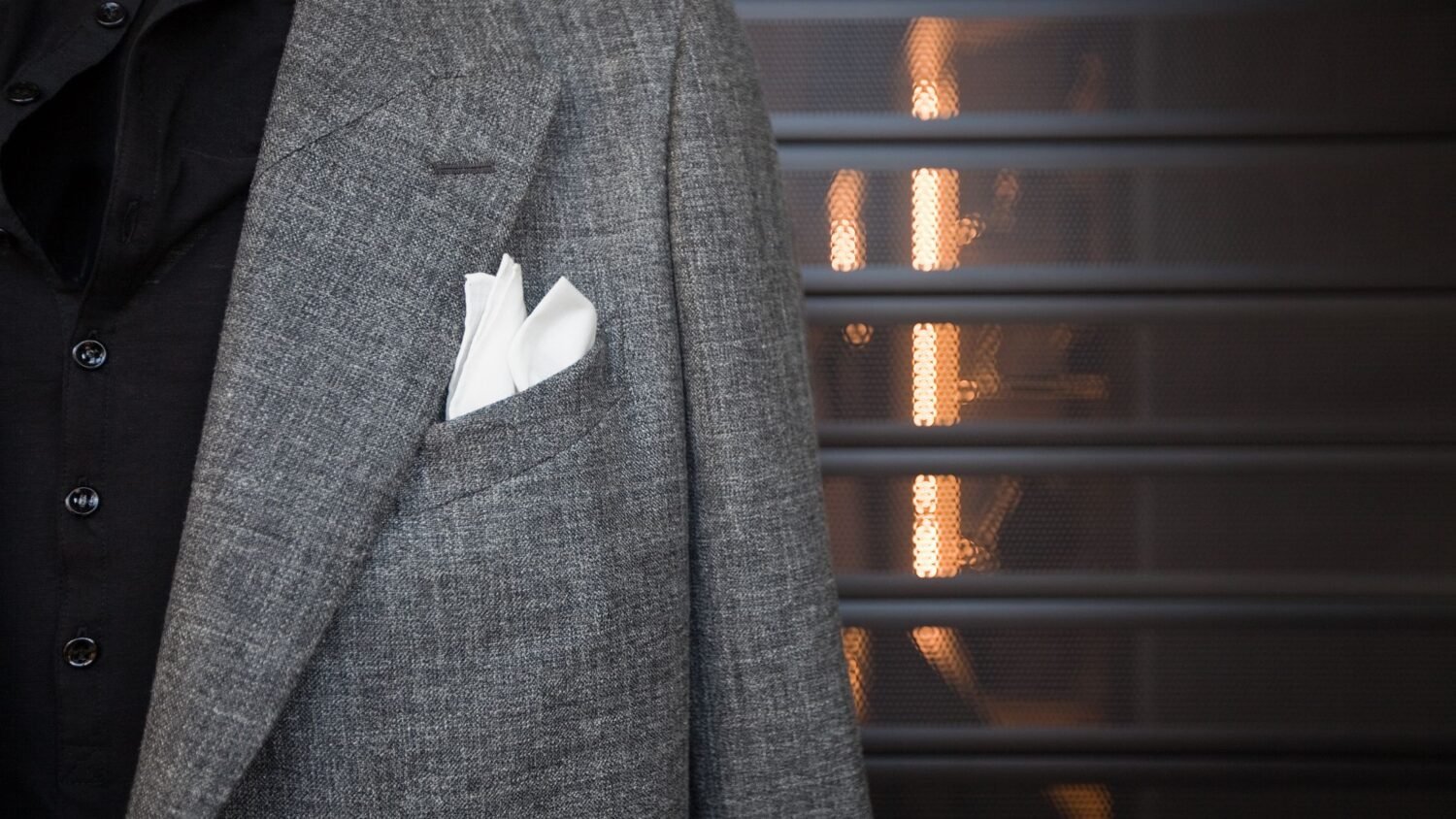 man wearing grey suit showing what is a man's role in a Christian relationship